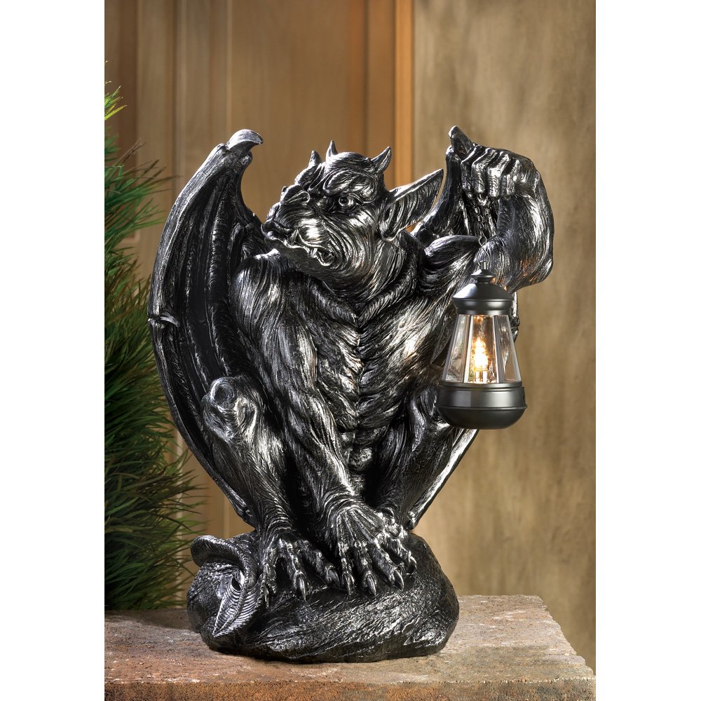 Gargoyle statue with lantern